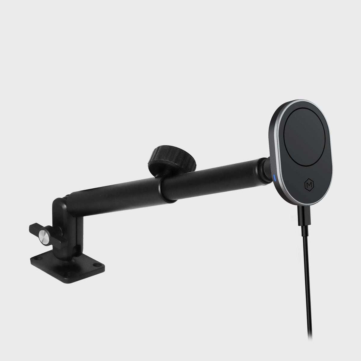 Heavy duty rugged MagSafe wireless charger phone mount with black and silver finish, adjustable arm, and industrial design for vehicle use